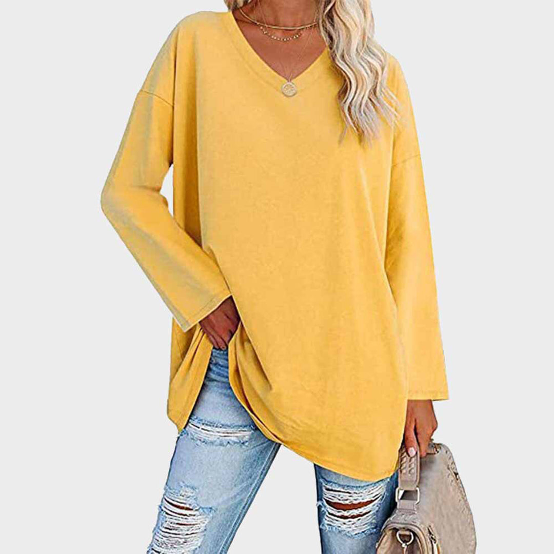 Comfortable women's long sleeve V-neck top, a stylish wardrobe essential for everyday fashion.