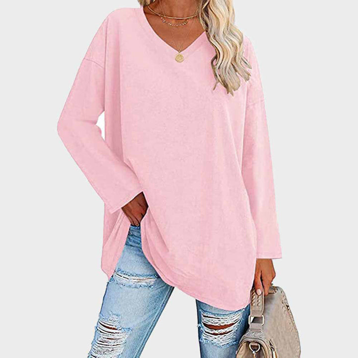Classic women's long sleeve V-neck top, offering an elegant and comfortable style for any season.