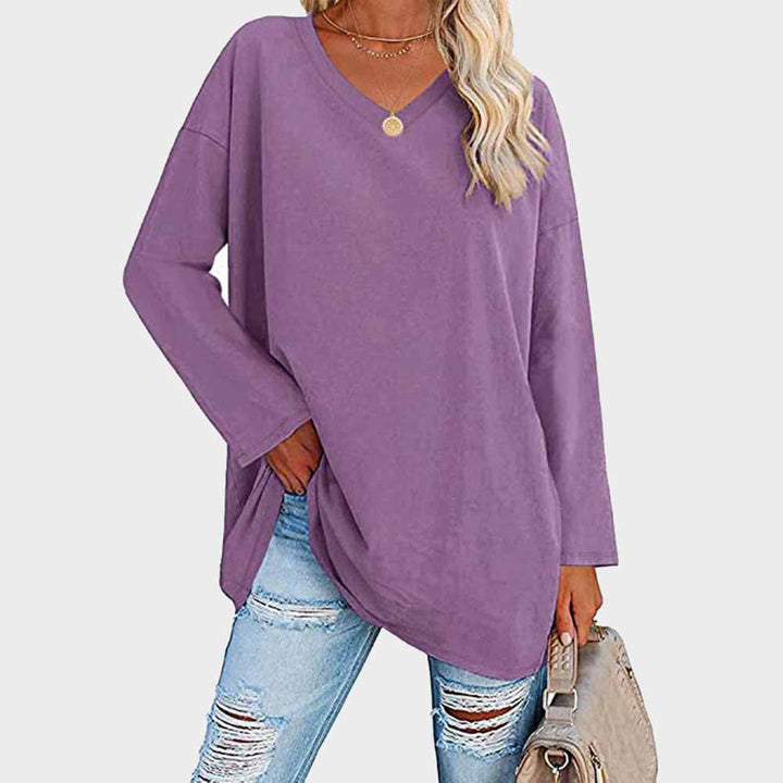 Fashionable women's V-neck long sleeve top, a versatile and elegant wardrobe essential.