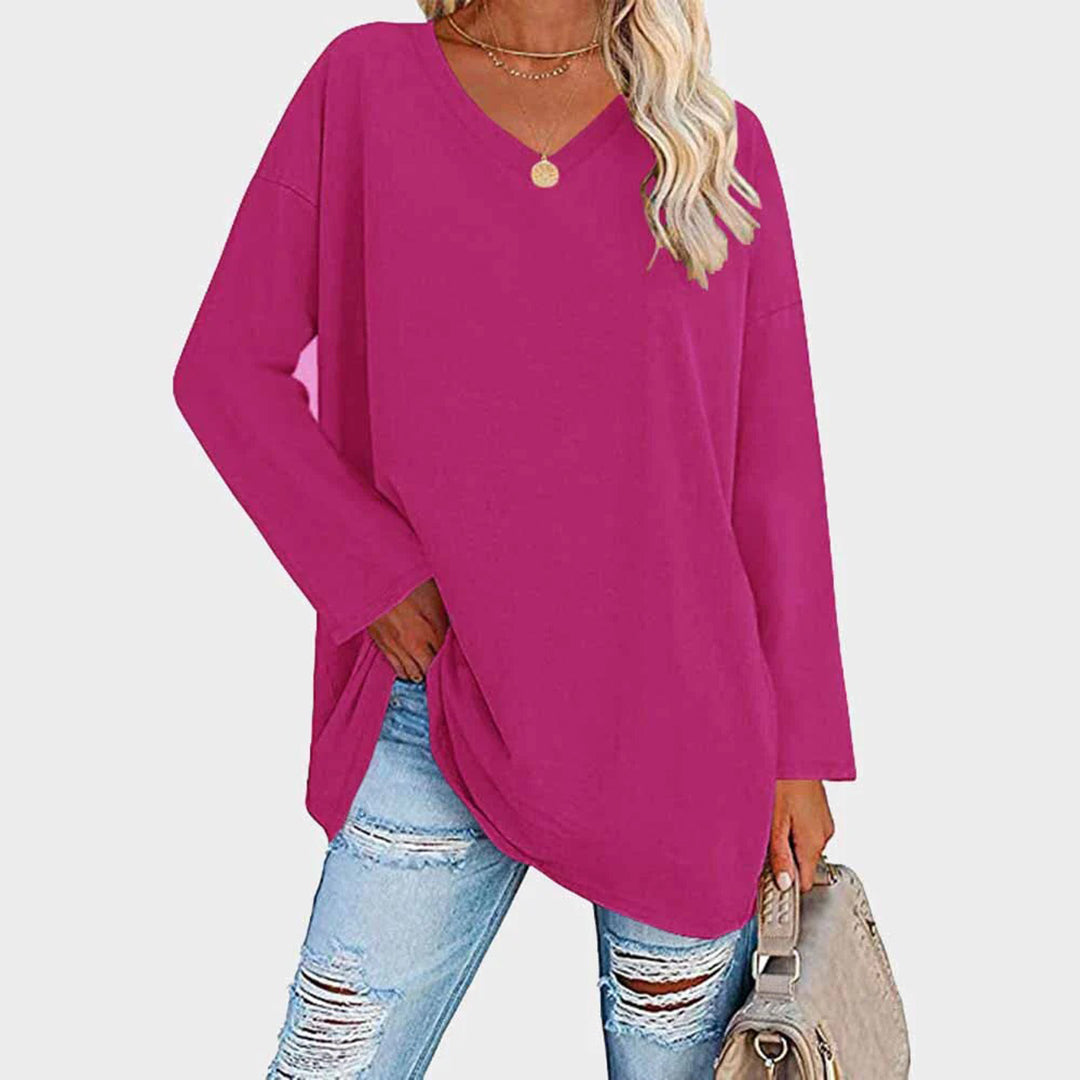 Women's elegant long sleeve V-neck top, perfect for a chic and comfortable fashion statement.