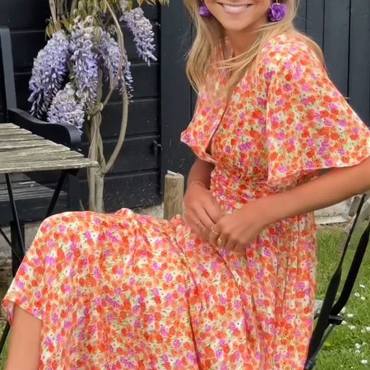 Chic women's V-neck maxi dress, offering a comfortable, flowy fit for all-day elegance.