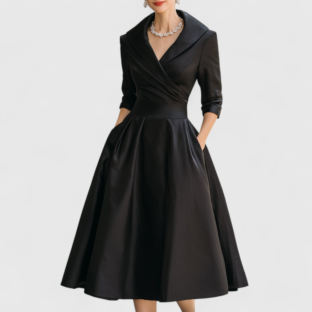Elegant women's V-neck midi dress with 3/4 sleeves and a flared skirt, perfect for versatile day-to-night wear.