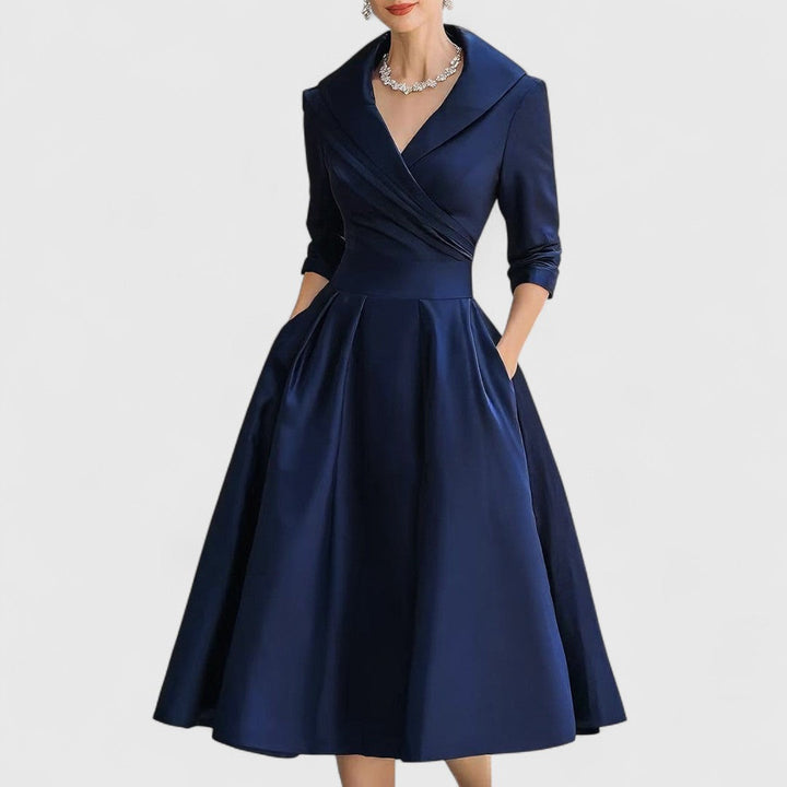 Versatile modest midi dress for women, V-neck, 3/4 sleeves, and a flared skirt, offering comfort and style.