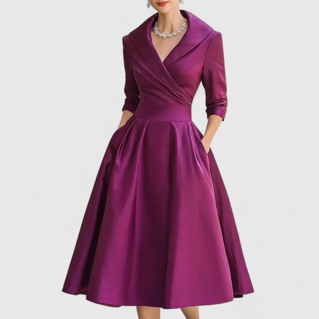 Comfortable elegant V-neck midi dress for women with 3/4 sleeves & a flattering flared skirt. Ideal chic wear.