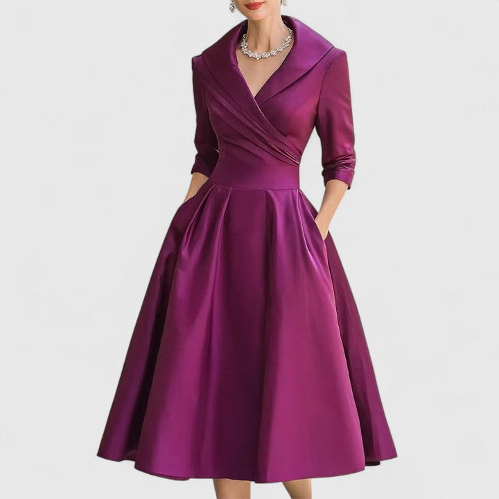 Comfortable elegant V-neck midi dress for women with 3/4 sleeves & a flattering flared skirt. Ideal chic wear.