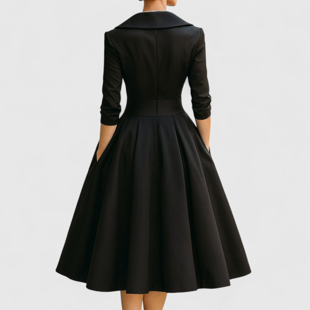 Women's elegant V-neck midi dress, 3/4 sleeves, comfort wear, and a versatile design. A chic day-to-night option.