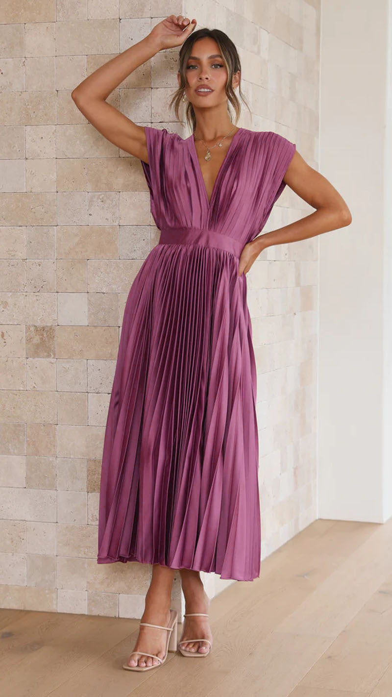 Versatile women's V-neck pleated midi dress, suitable as a summer dress or elegant occasion wear.