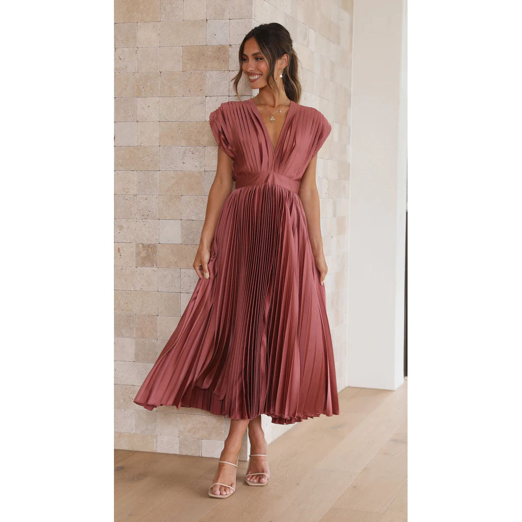 Stylish women's V-neck midi dress with a graceful pleated skirt, perfect for an elegant party.