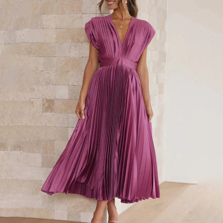 Women's elegant V-neck pleated maxi dress outfit, sophisticated for wedding guests & parties.