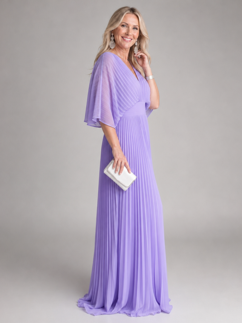 Flowing long sleeve V neck maxi dress for women, featuring elegant pleats, ideal for parties & evening wear.