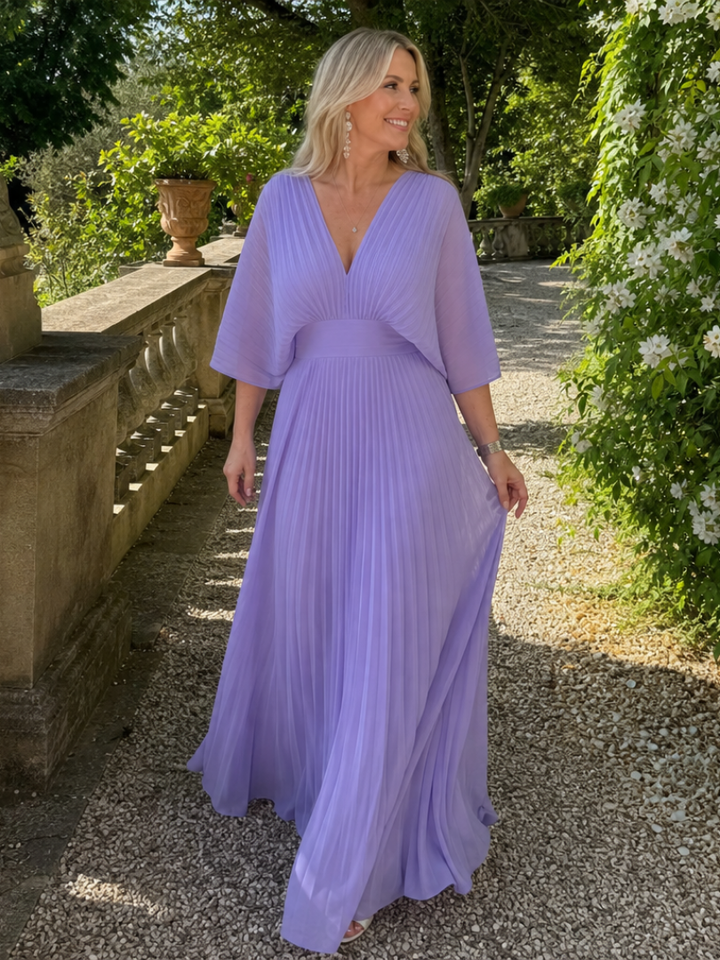 Beautiful women's elegant V neck maxi dress, featuring delicate pleats and long sleeves, great for special events.