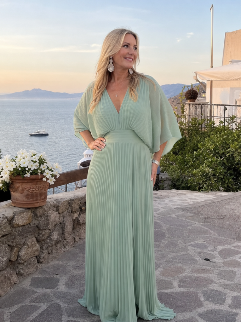 Chic women's V neck pleated maxi dress with elegant long sleeves, offering a flowing silhouette for events.