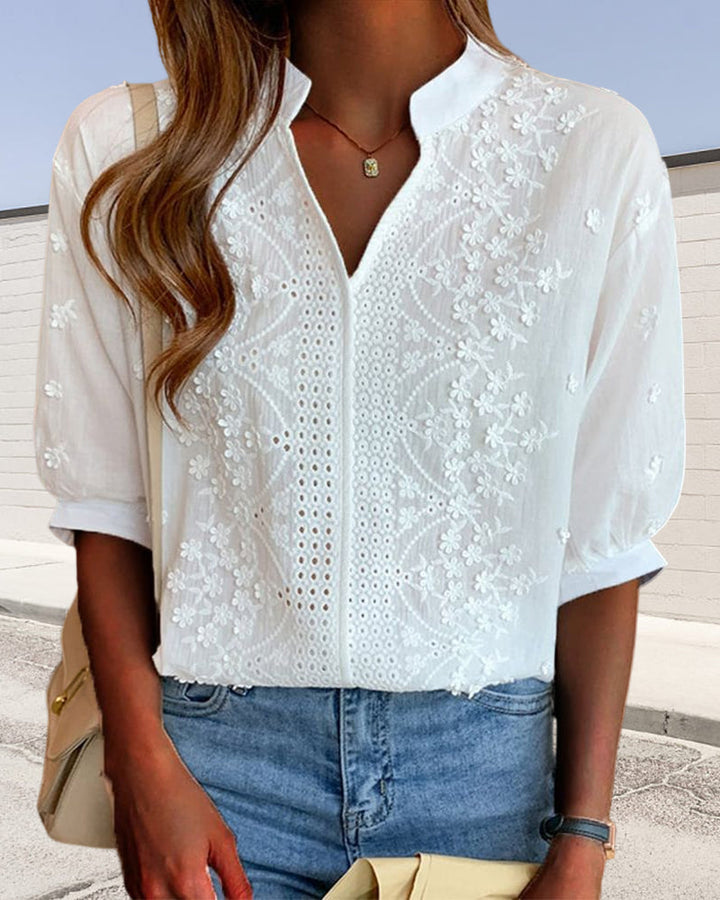 Stylish V-neck puff sleeve blouse for women, a comfortable and elegant top ideal for summer fashion.