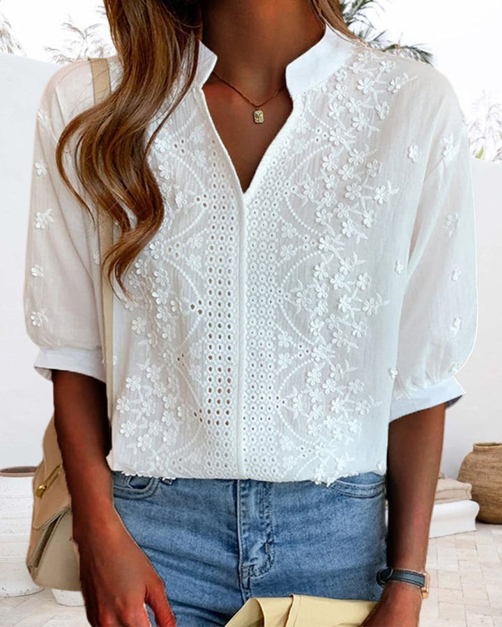 Women's summer V-neck blouse with chic puff sleeves, an elegant and versatile top for warm weather style.