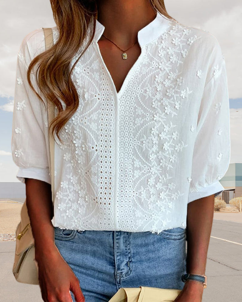 Casual chic women's V-neck puff sleeve blouse, elegant daywear perfect for summer fashion and comfort.