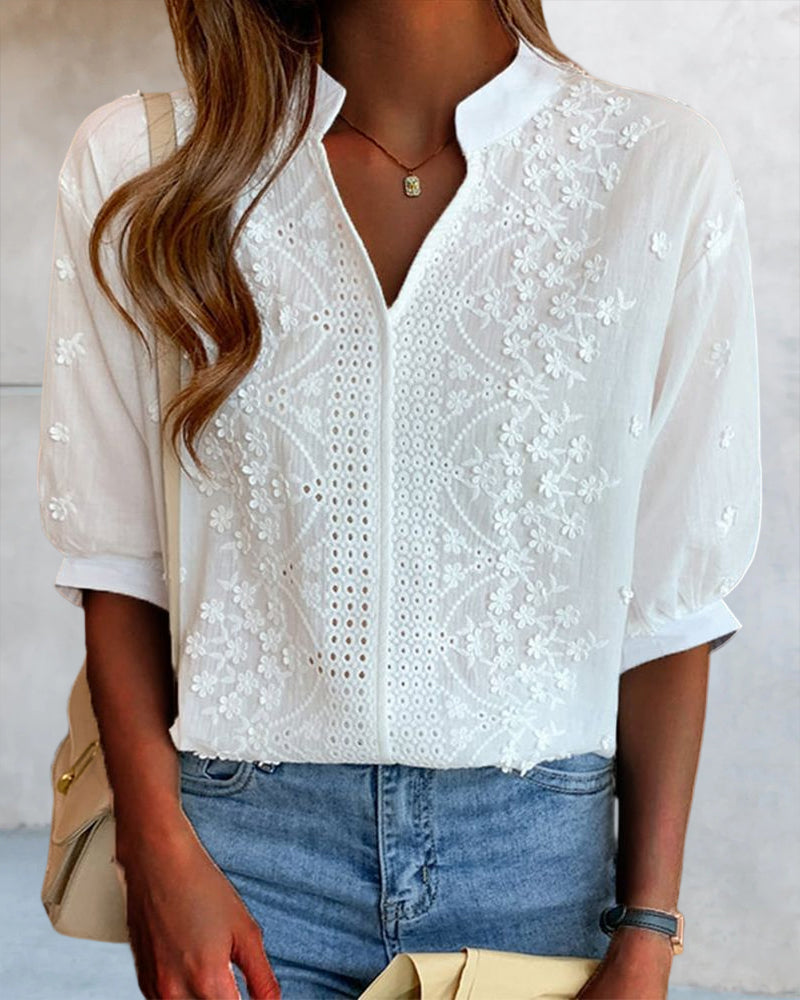 Sophisticated V-neck puff sleeve blouse for women, ideal for elegant summer fashion and versatile daywear.