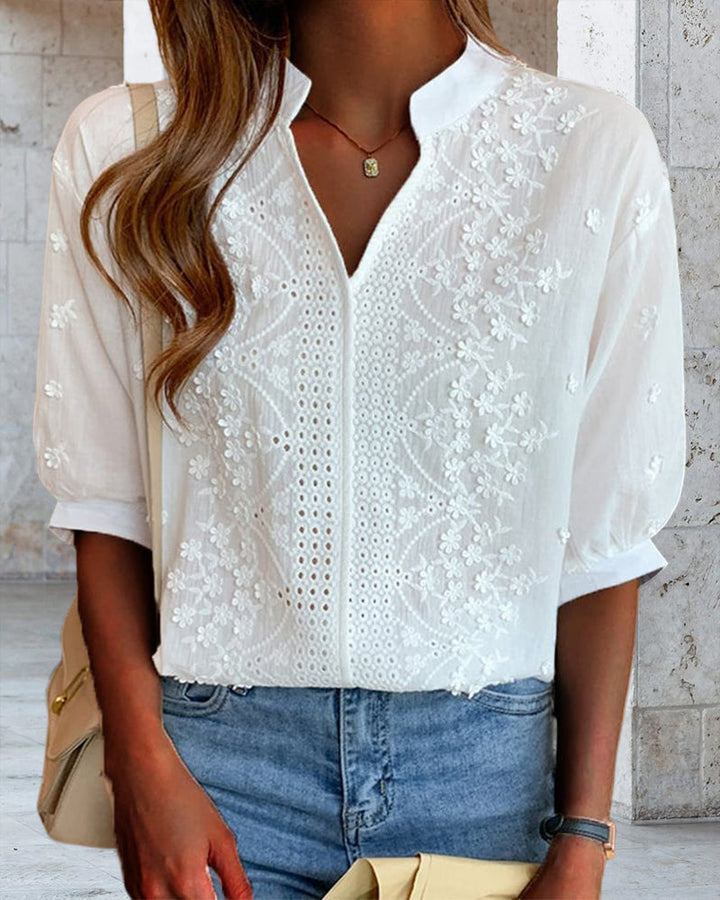 Fashionable V-neck puff sleeve top for women, an elegant and comfortable blouse perfect for summer style.