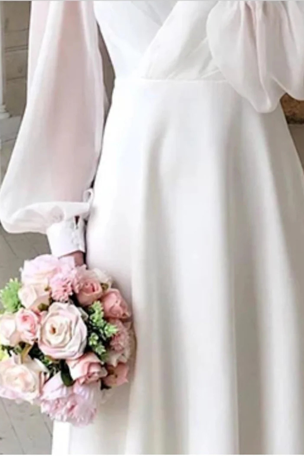 Beautiful women's formal midi dress with V-neck and puff sleeves, suitable for evening wear and events.