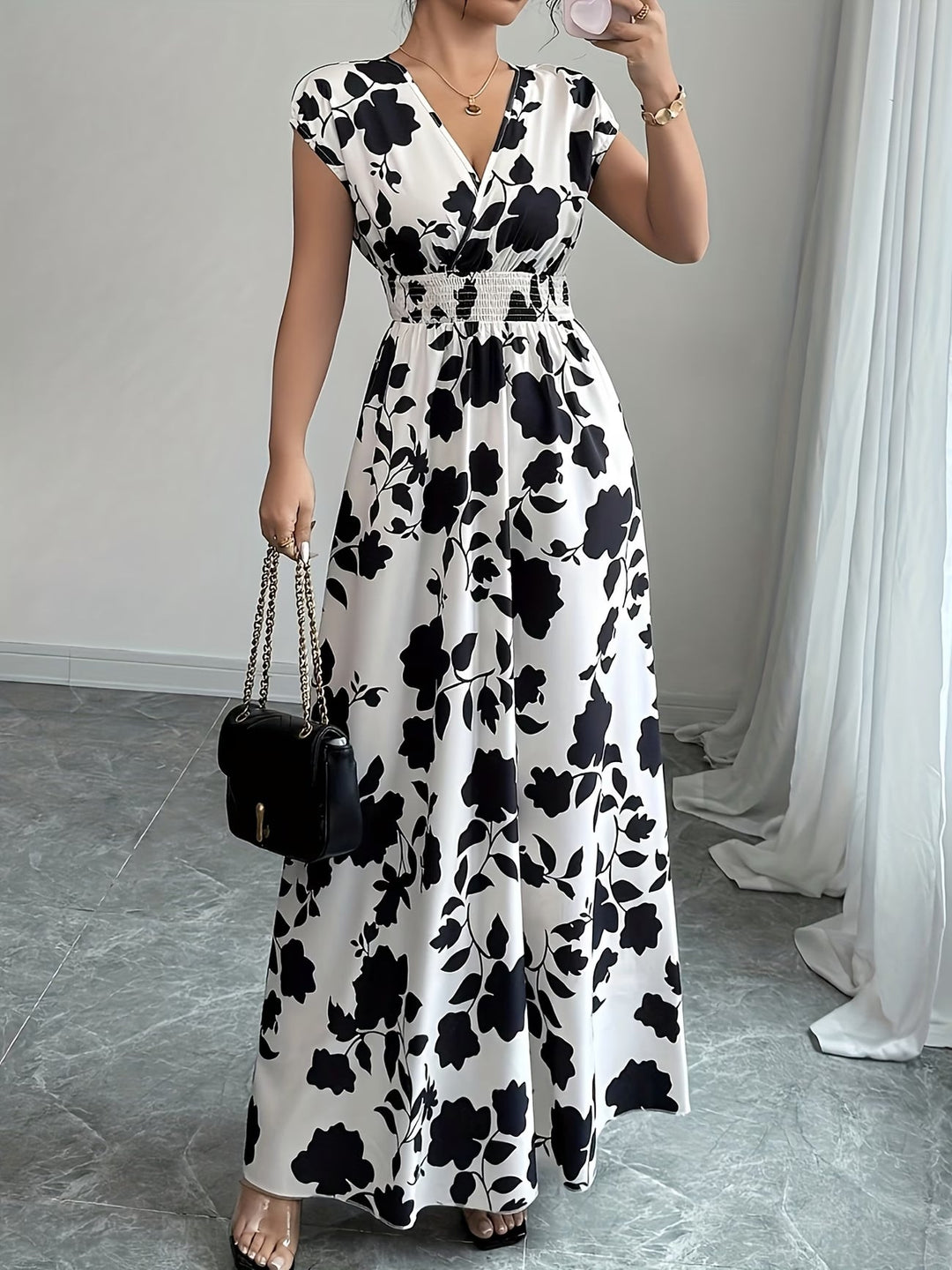 Women's sophisticated V-neck sleeveless midi dress. A versatile and timeless summer essential.