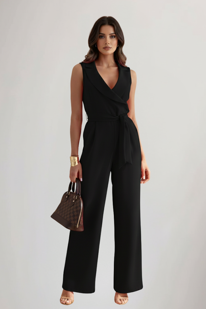 Modern women's V-Neck sleeveless jumpsuit with a cinched tie-waist. Effortlessly chic and comfortable for summer.