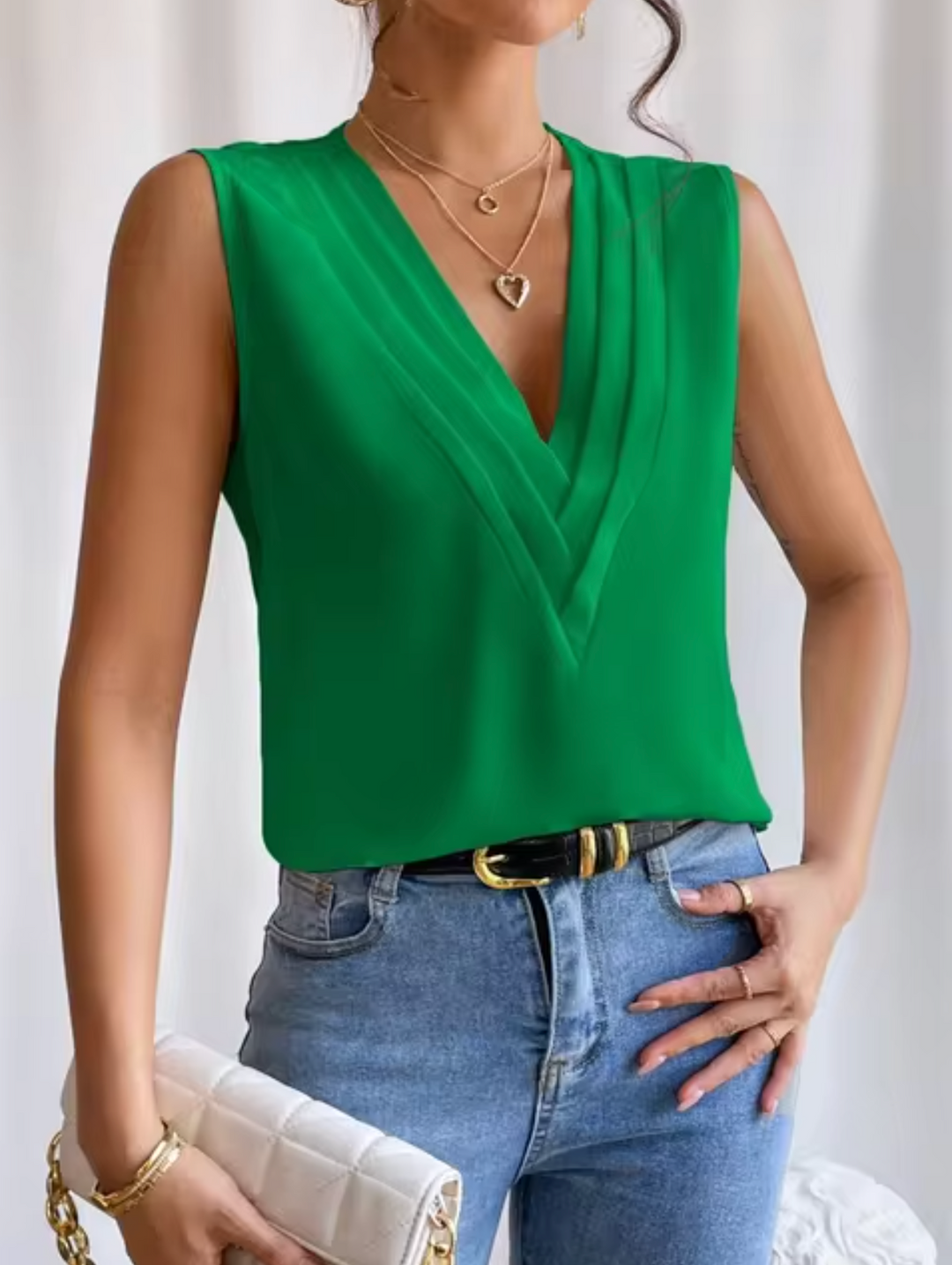 New elegant women's V-neck sleeveless top, a must-have for chic summer and spring fashion, versatile style.