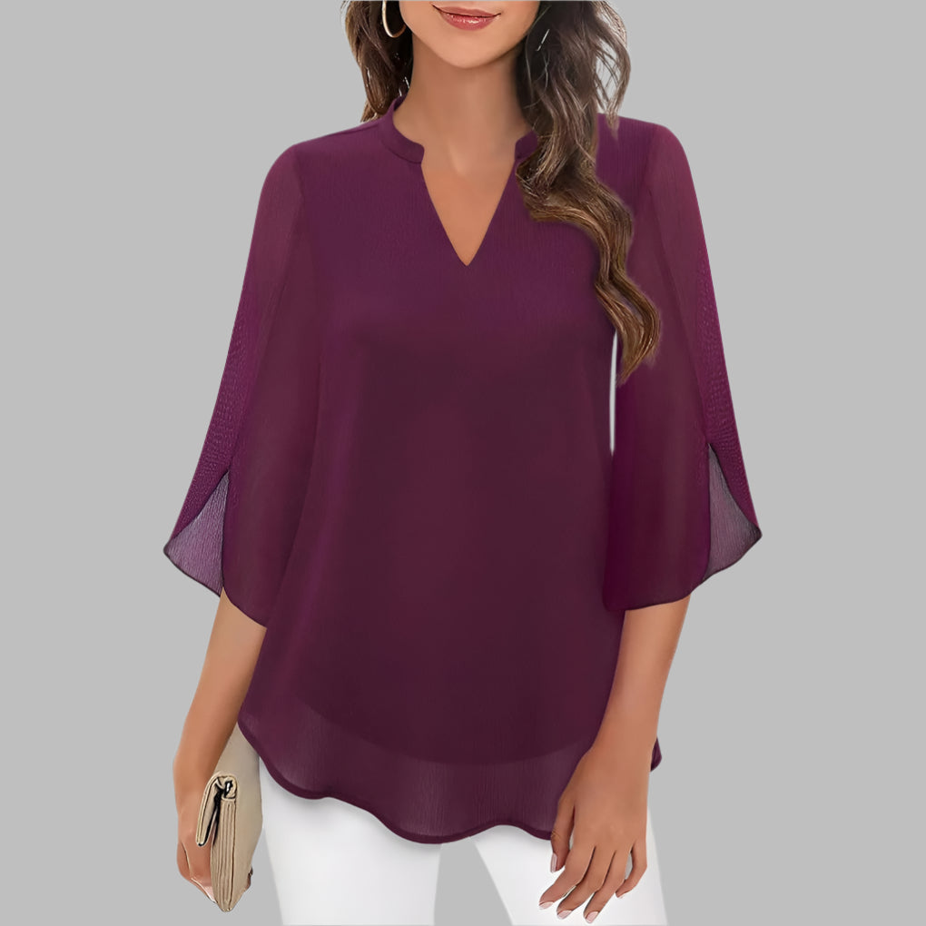 Versatile women's V-neck top featuring unique petal sleeves. Elegant summer blouse, ideal for daily wear.