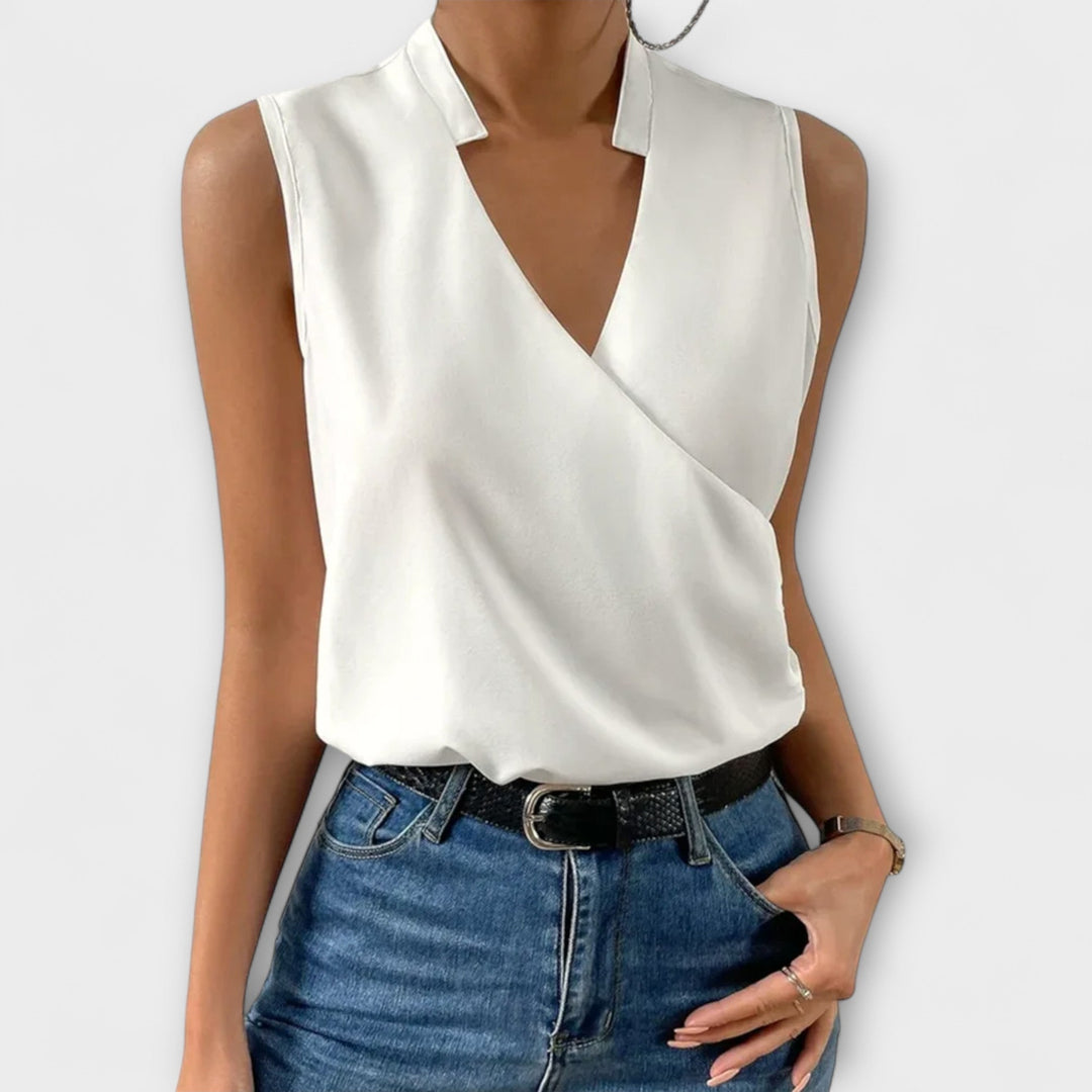 Elegant women's V-neck top in a solid color, perfect for stylish everyday wear & spring fashion.