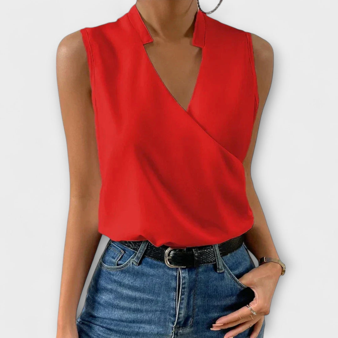Flattering women's V-neck top in a solid, designed for comfort and elegant casual wear.