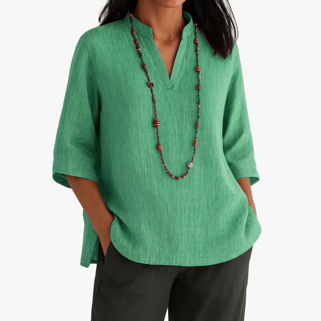 Women's versatile V-neck tunic blouse top, featuring a relaxed fit & 3/4 sleeves for elegant casual wear.