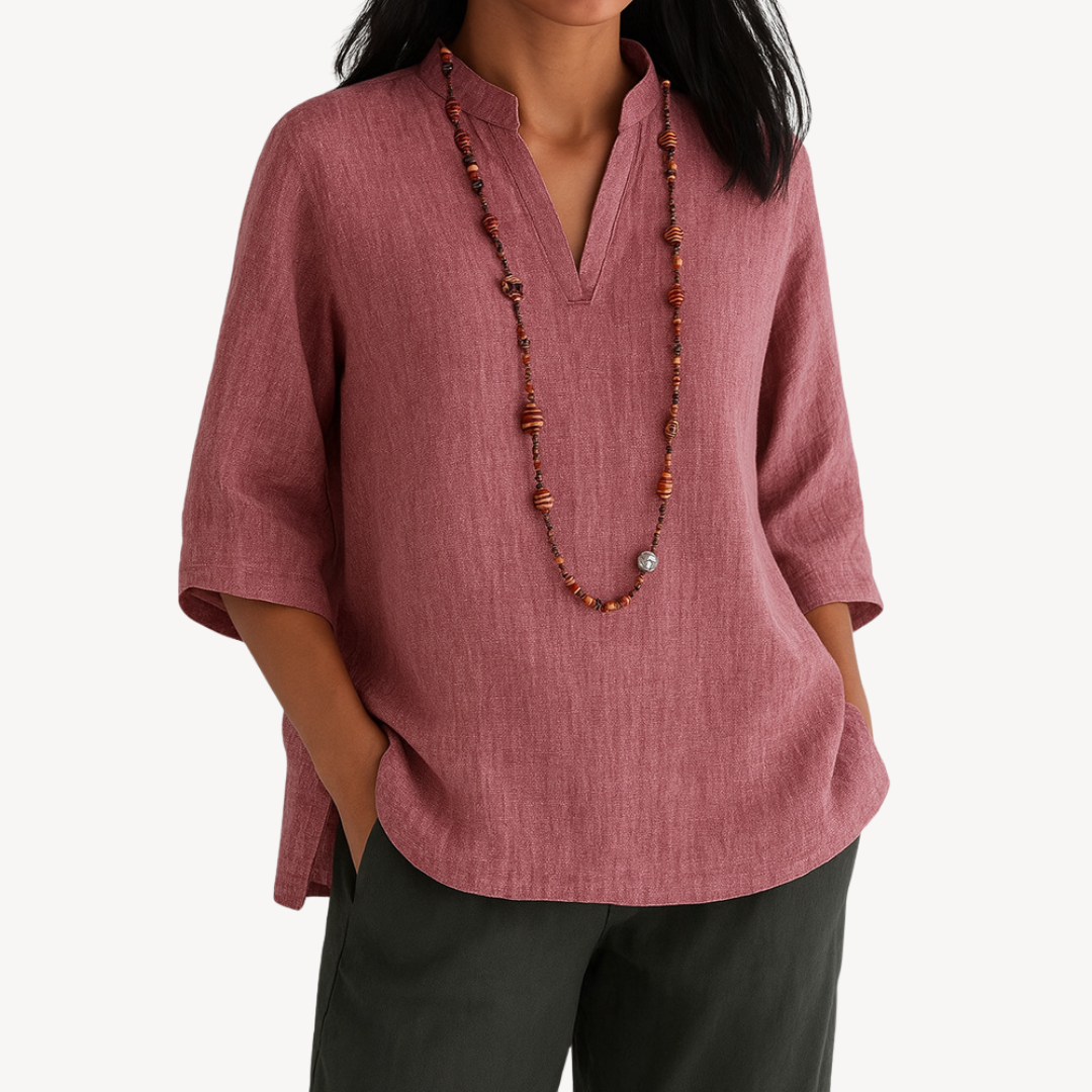 Comfortable women's V-neck tunic top with relaxed fit & 3/4 sleeves. Chic everyday blouse in various colors.