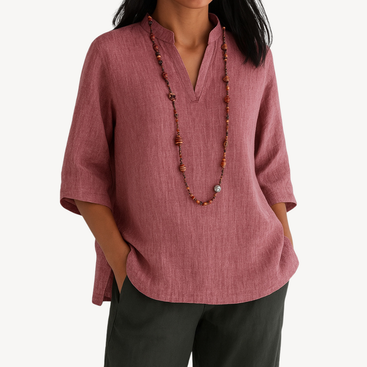 Comfortable women's V-neck tunic top with relaxed fit & 3/4 sleeves. Chic everyday blouse in various colors.