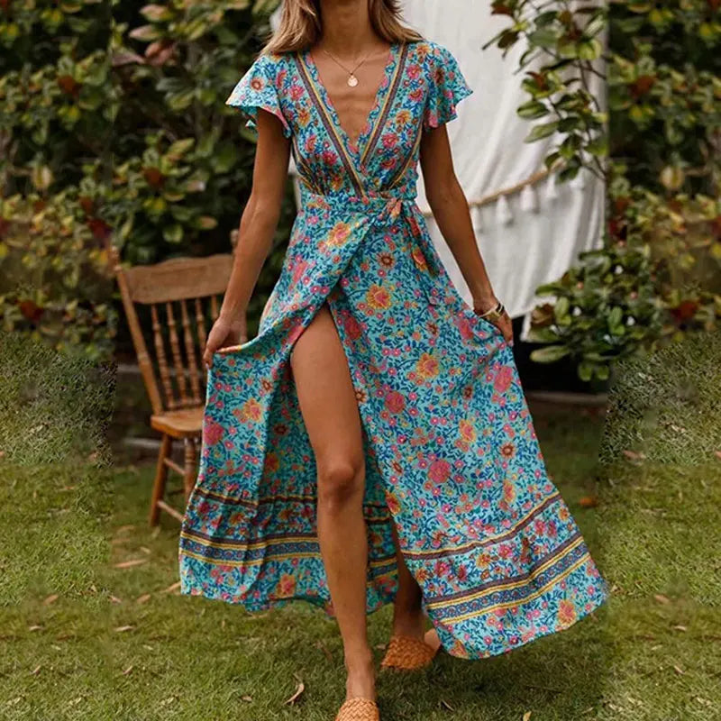 Elegant women's V-neck wrap maxi dress with flutter sleeves, perfect for a wedding guest or summer party.