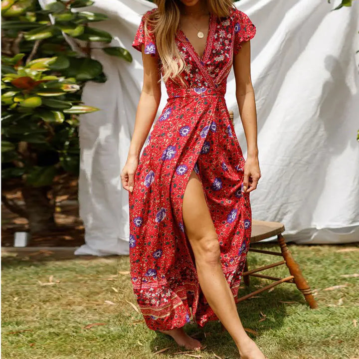 Stylish women's V-neck wrap dress, a long maxi with elegant flutter sleeves & tiered skirt for any occasion.