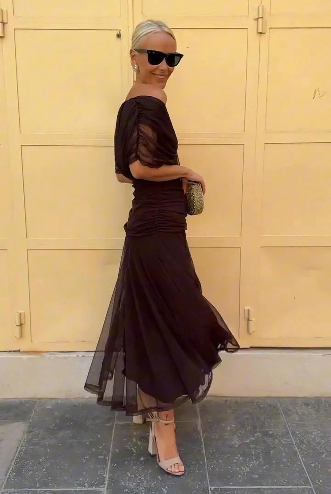Elegant women's V-neck wrap style maxi dress, featuring delicate sheer sleeves. Ideal formal or occasion wear.