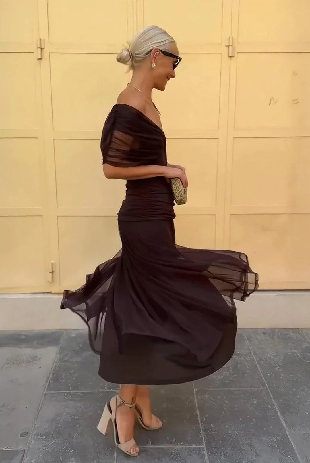 Sophisticated women's V-neck wrap maxi dress, designed with elegant sheer sleeves. Perfect for formal and evening wear.