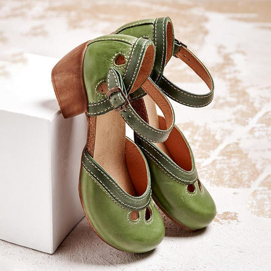 Casual women's Verona Retro platform sandals with a low heel and stylish buckle strap, great for summer.
