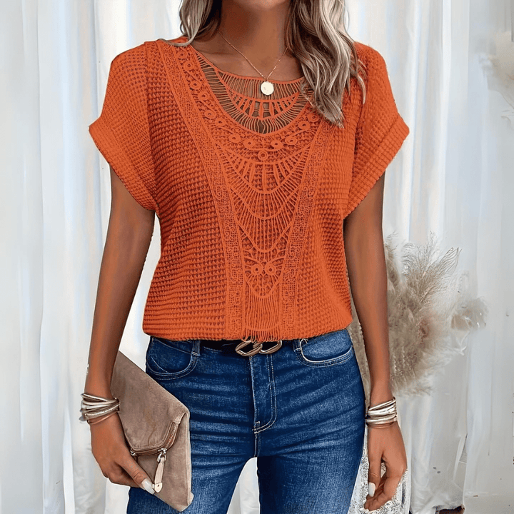 Stylish women's vintage lace blouse, a versatile top for elegant or casual summer fashion.
