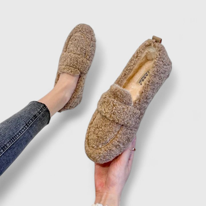Cozy, warm winter loafer slippers for women, providing elegant comfort as house shoes with a non-slip design.
