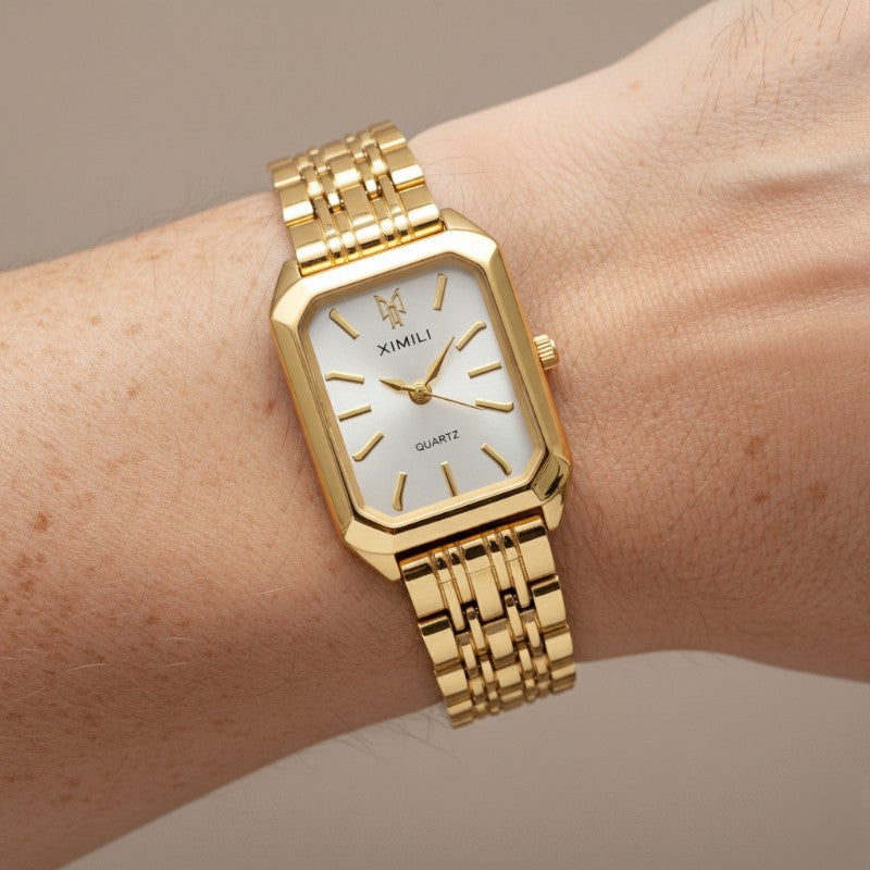 Elegant women's watch with unique geometric dial and stylish chain strap. Modern wrist jewelry, perfect for fashion-forward ladies.