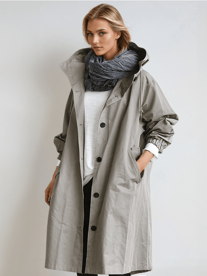 Elegant women's water-repellent trench coat, perfect for all-season wear. Classic, chic outerwear for versatile styling.
