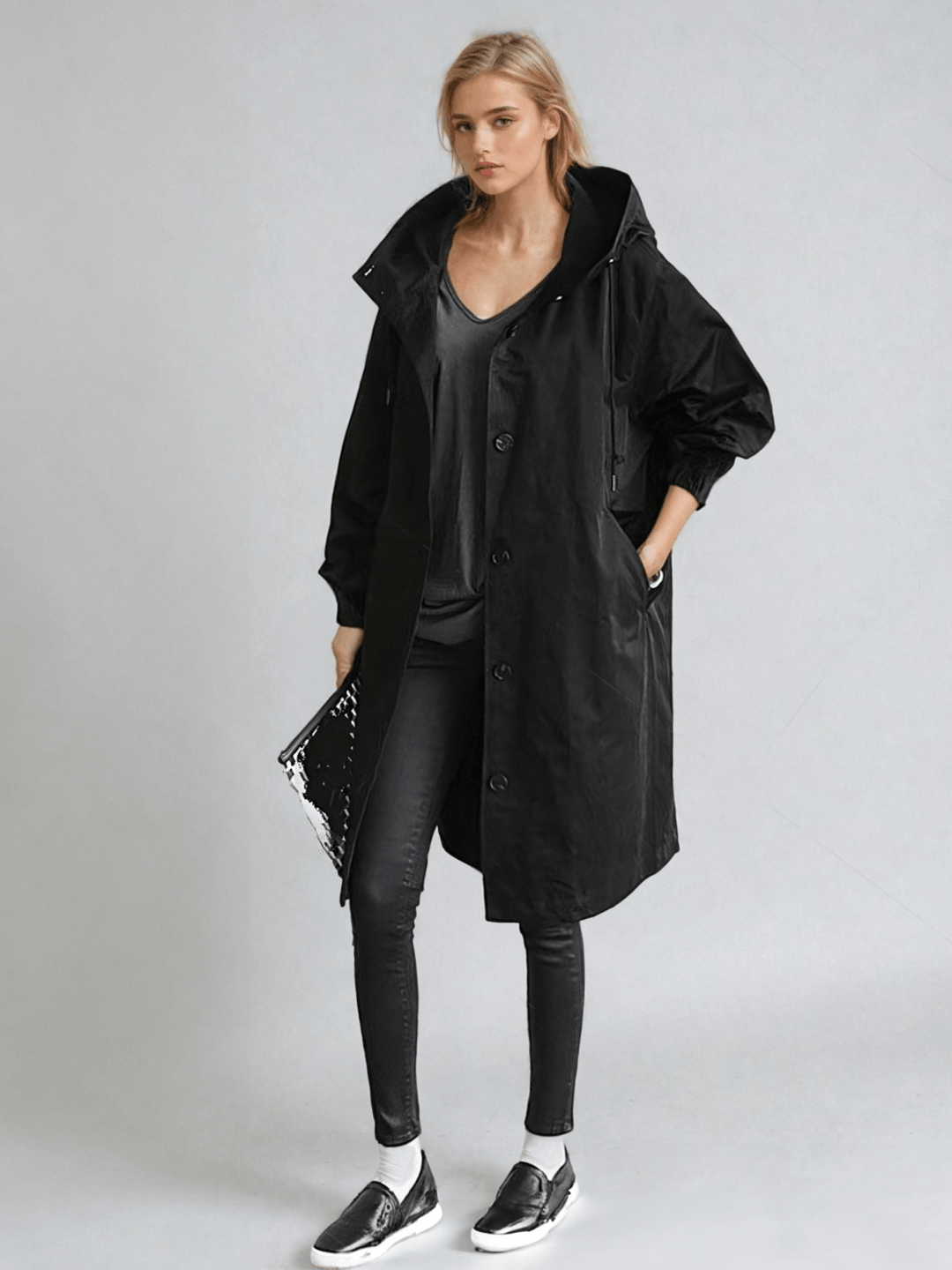 Chic women's all-season trench coat, water-repellent for spring & autumn. Versatile outerwear for transitional weather.