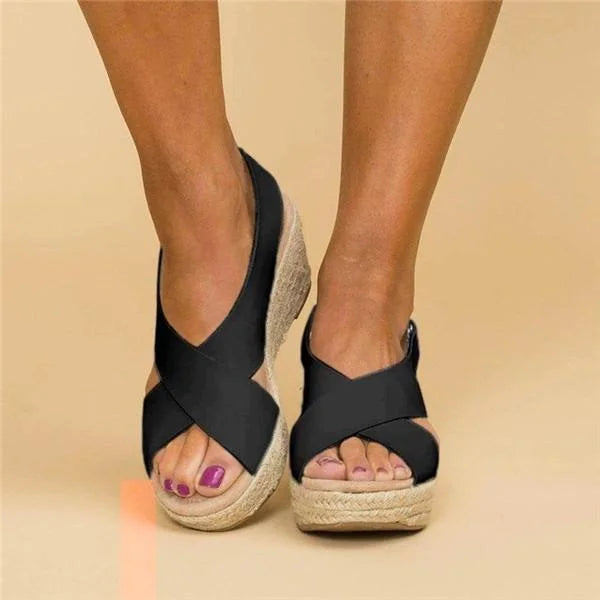 Elegant women's wedge sandals with a comfortable sole, perfect for stylish summer outfits.