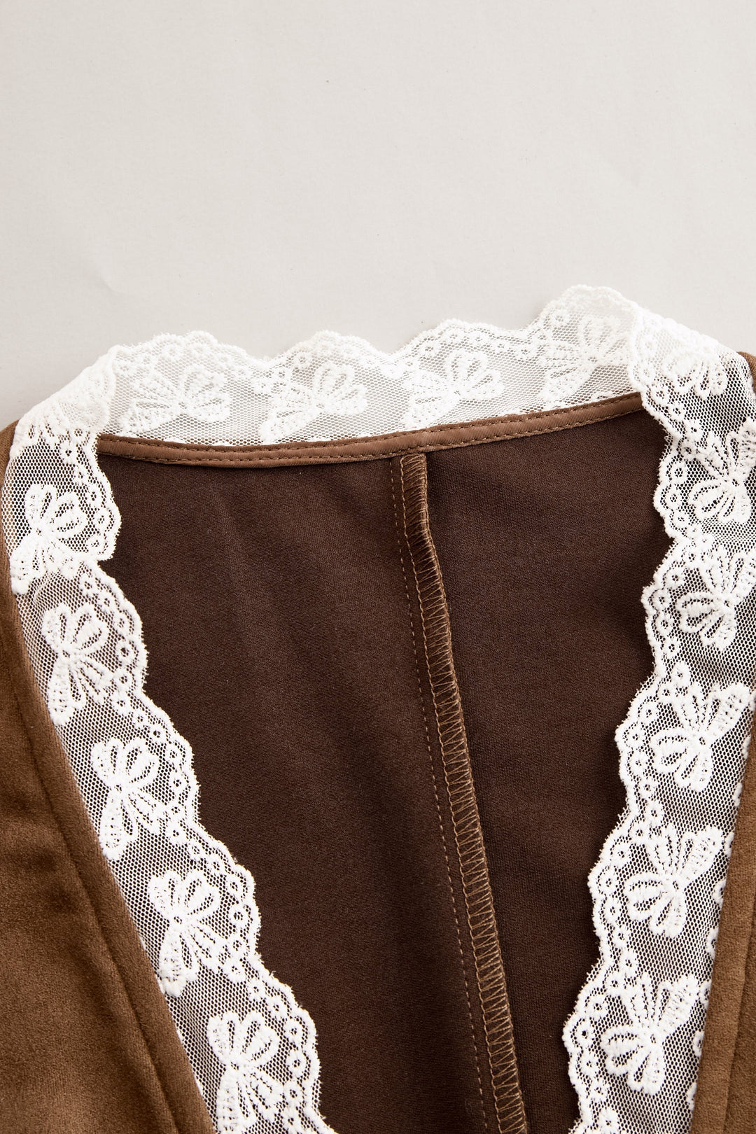 Women's elegant western lace blouse with V-neck & long sleeves. Snap buttons add country charm to this fitted top.