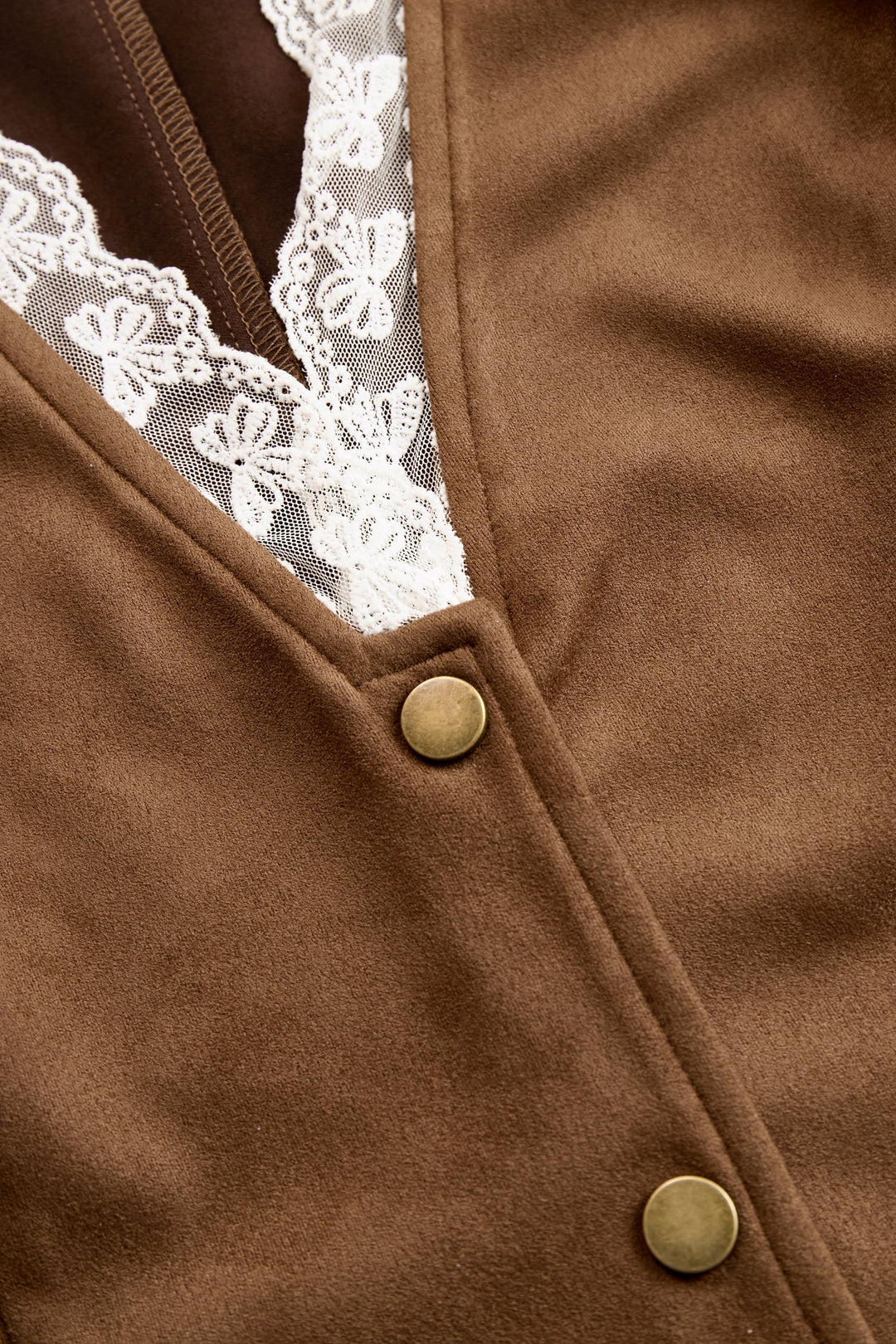 Unique women's western lace blouse. V-neck, long sleeves & snap button details. Blends boho style with rustic chic elegance.
