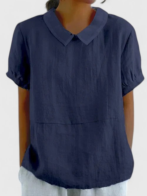 Stylish women's button-down shirt in a versatile classic design, ideal for everyday fashion or business casual.
