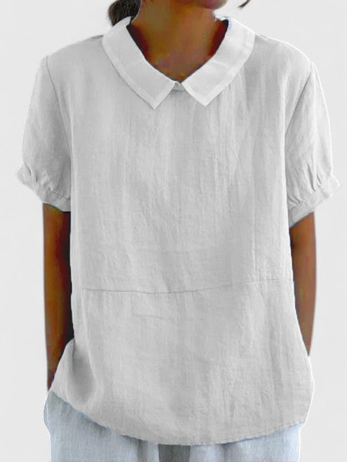Close-up of elegant women's button-down shirt fabric, showing classic style and quality for refined office wear.