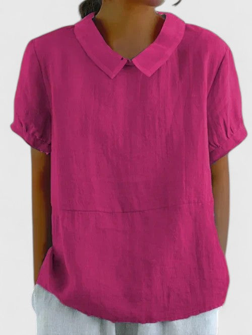 Women's long-sleeve button-down shirt, a classic elegant top for business casual and versatile everyday fashion.
