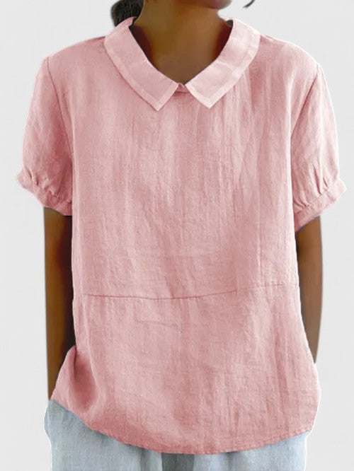 Back view of a women's elegant long-sleeve button-down shirt, showcasing classic fit for versatile office wear.