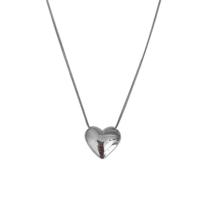 Long elegant pearl lariat necklace with a gold chain. This women's fashion jewelry features white drop pearls.