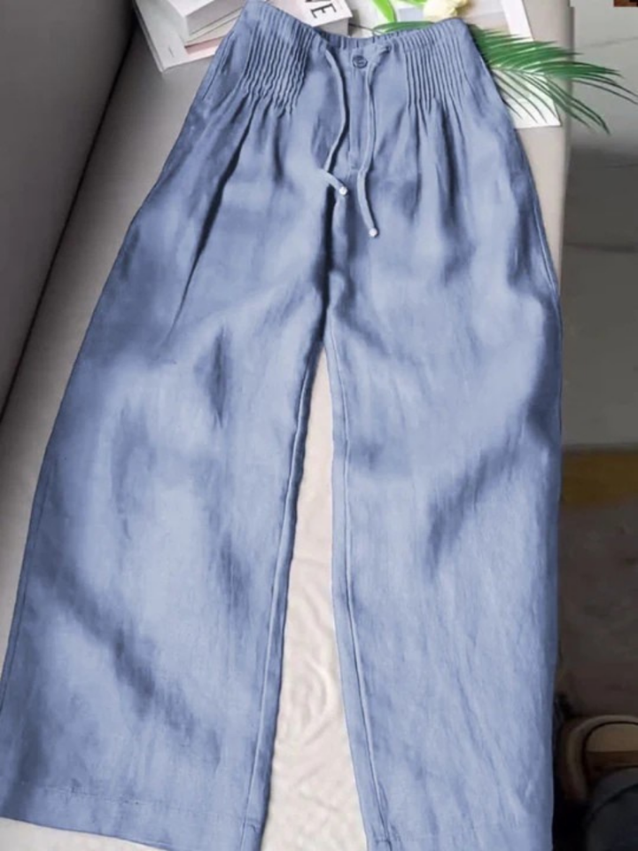 Comfortable women's wide-leg cotton blend pants with a relaxed fit, designed for versatile elegant styling.